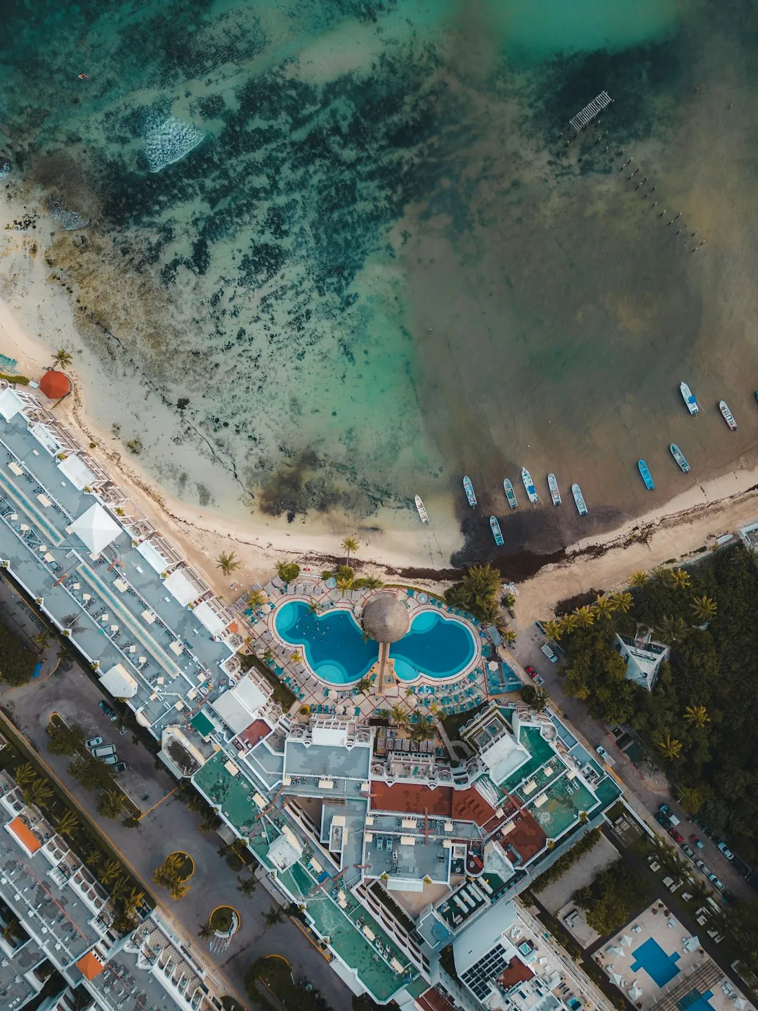 Aerial view of a beach and turquoise water in Cancun