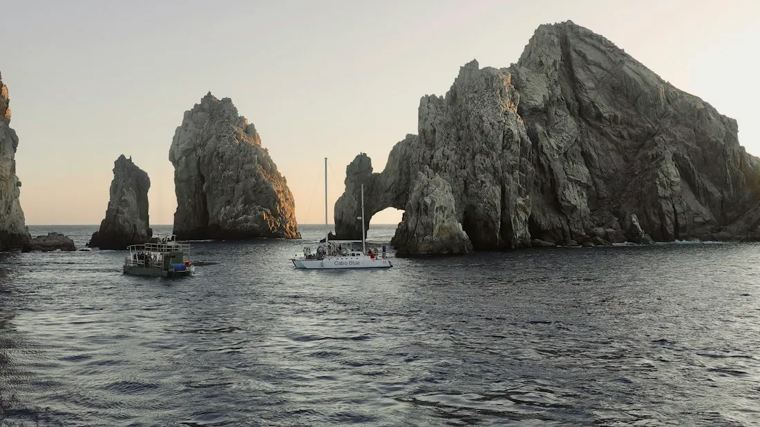 A catamaran by the arch at Land's End, Cabo San Lucas